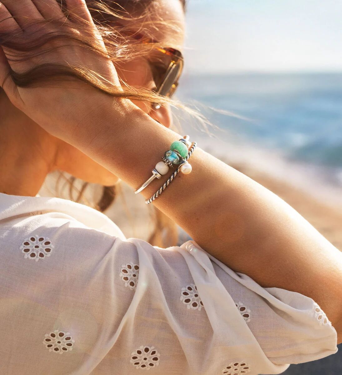 Handcrafted bracelets worn beside the ocean on Kenya's Swahili Coast