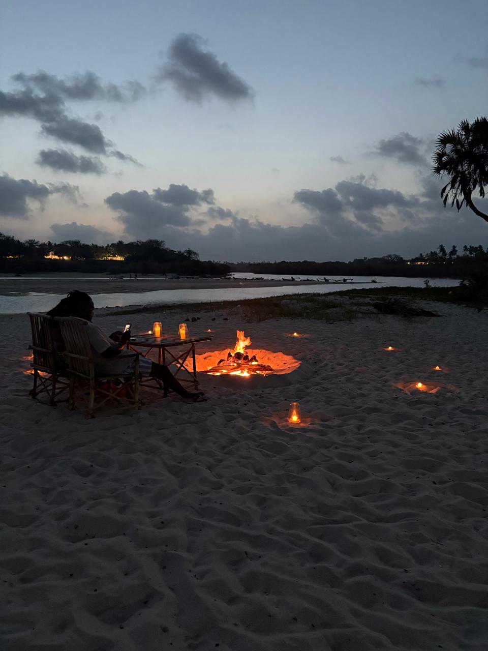 Candlelit beach bonfire for two at dusk, Diani, Kenya